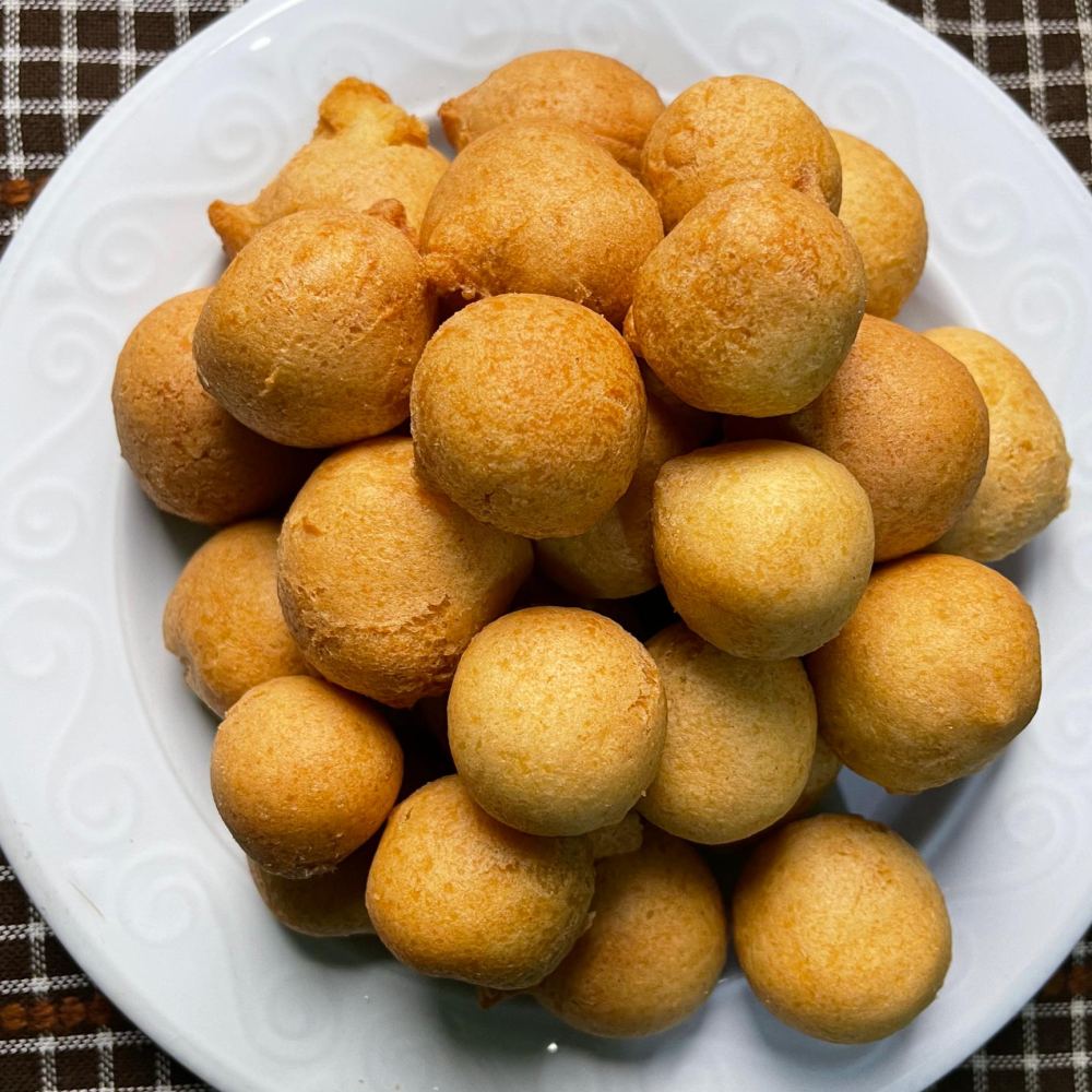 A plate of golden drop doughnuts made by a student